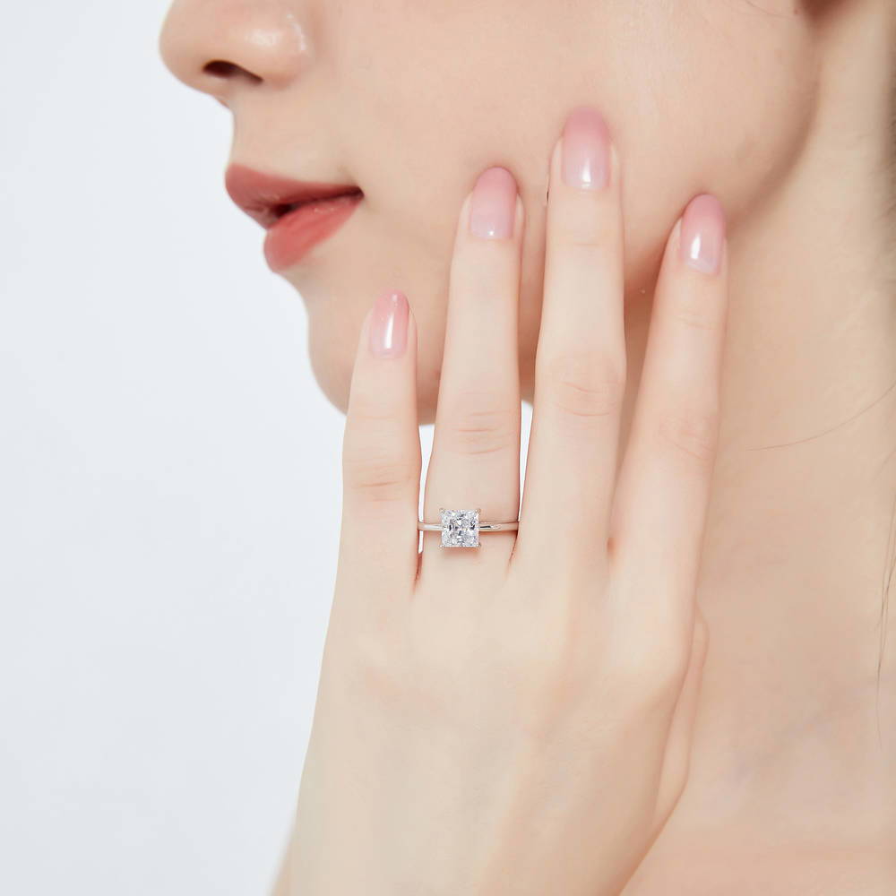 Model wearing Solitaire 1.6ct Princess CZ Ring Set in Sterling Silver