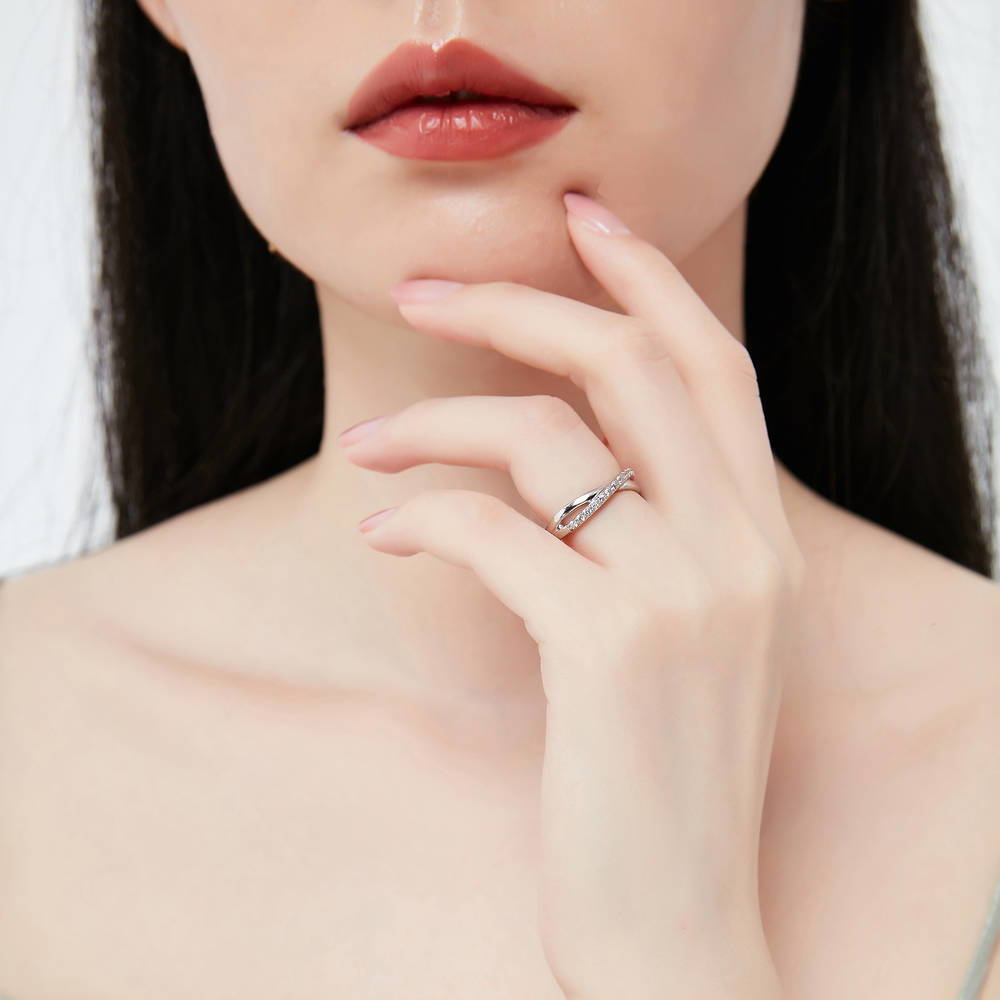 Model wearing 3-Stone Simulated Ruby Cushion CZ Ring Set in Sterling Silver