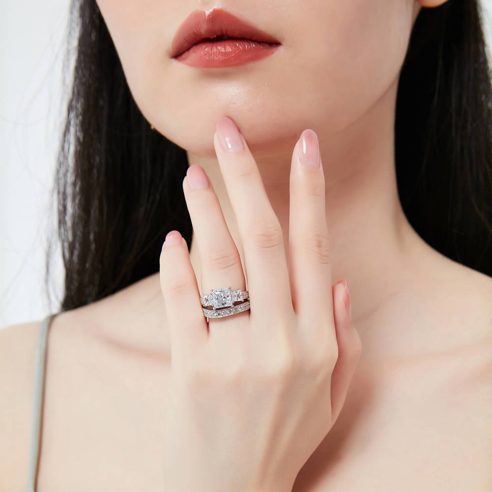 Model wearing 3-Stone Princess CZ Ring Set in Sterling Silver