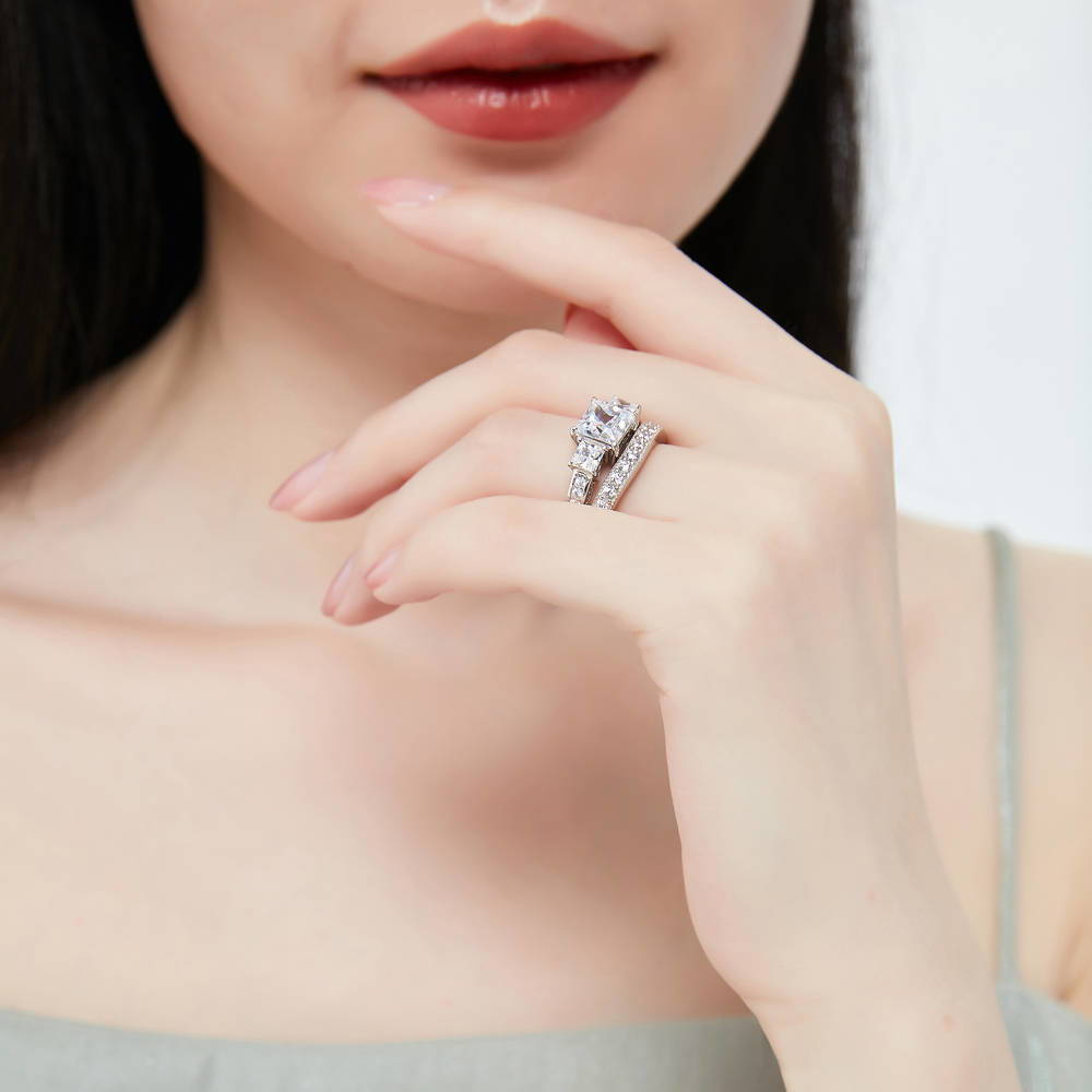 Model wearing 3-Stone Princess CZ Ring Set in Sterling Silver