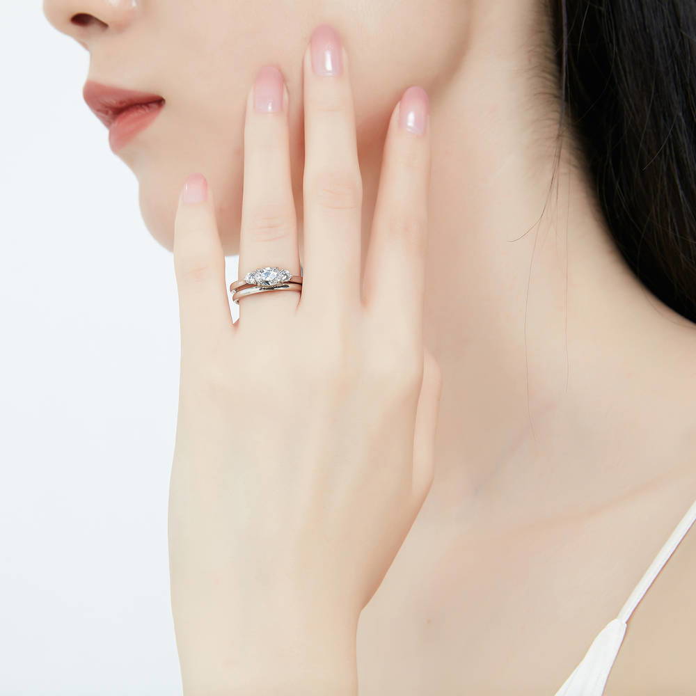 Model wearing 3-Stone East-West Oval CZ Ring Set in Sterling Silver, 2 of 12