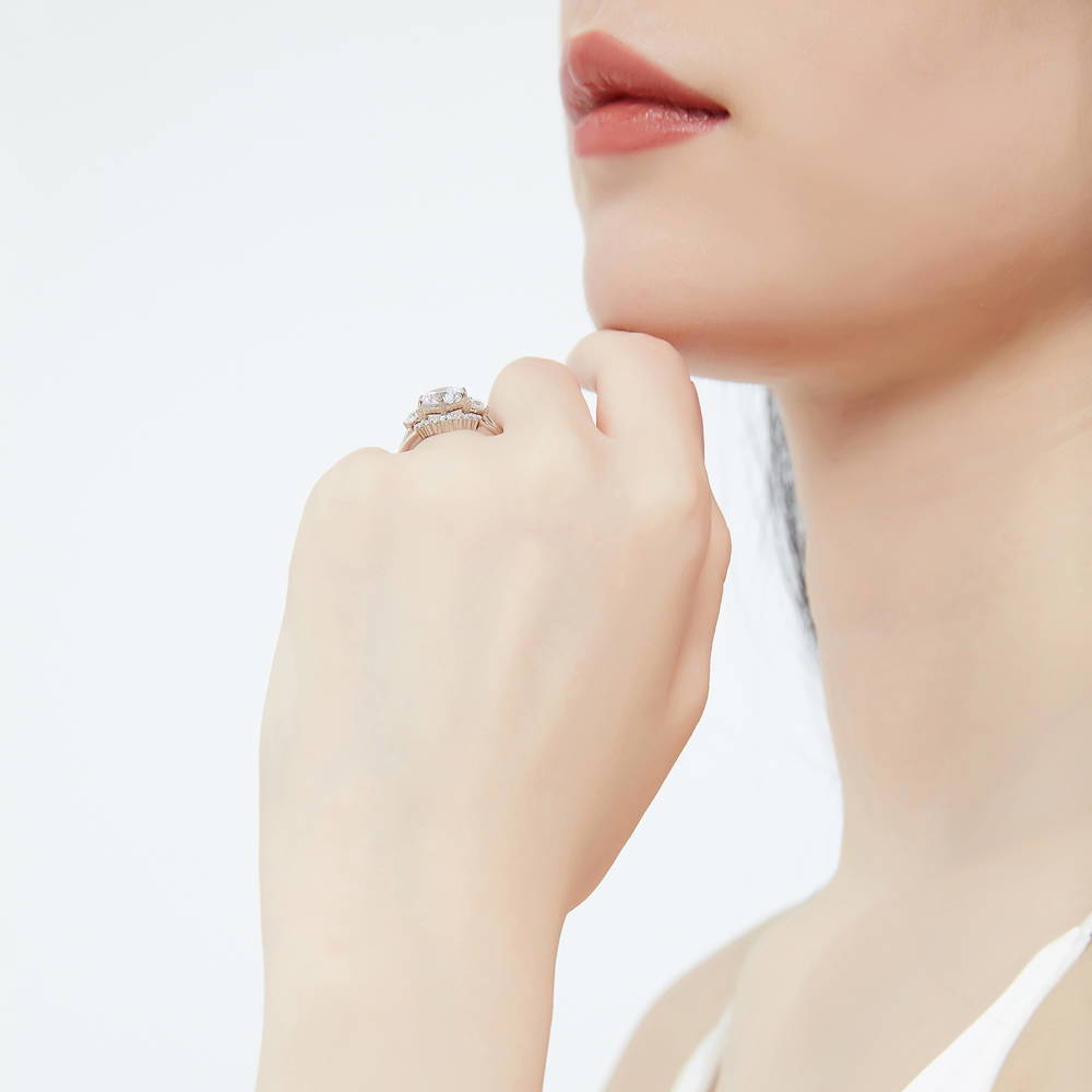 Model wearing 3-Stone 7-Stone Round CZ Ring Set in Sterling Silver