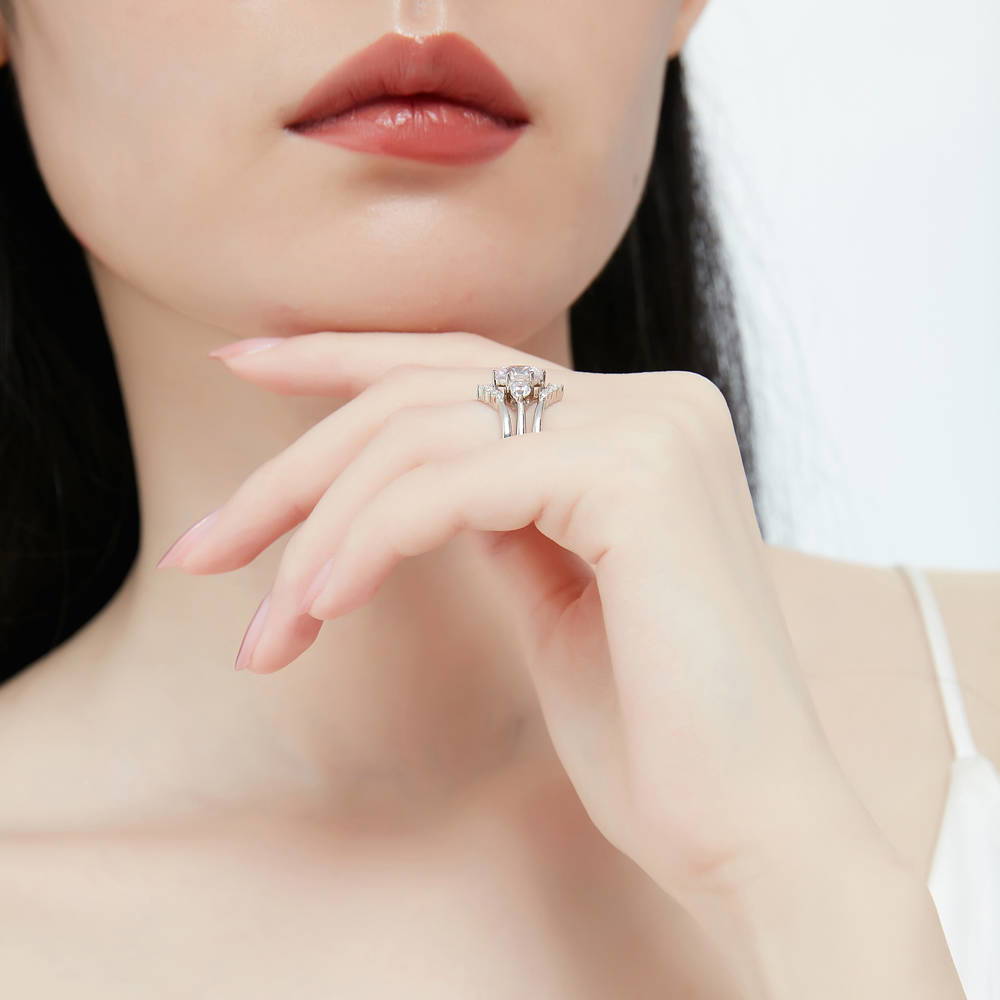 Model wearing 3-Stone 7-Stone Round CZ Ring Set in Sterling Silver