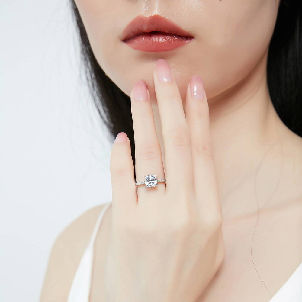 Model wearing Solitaire 2ct Cushion CZ Ring in Sterling Silver