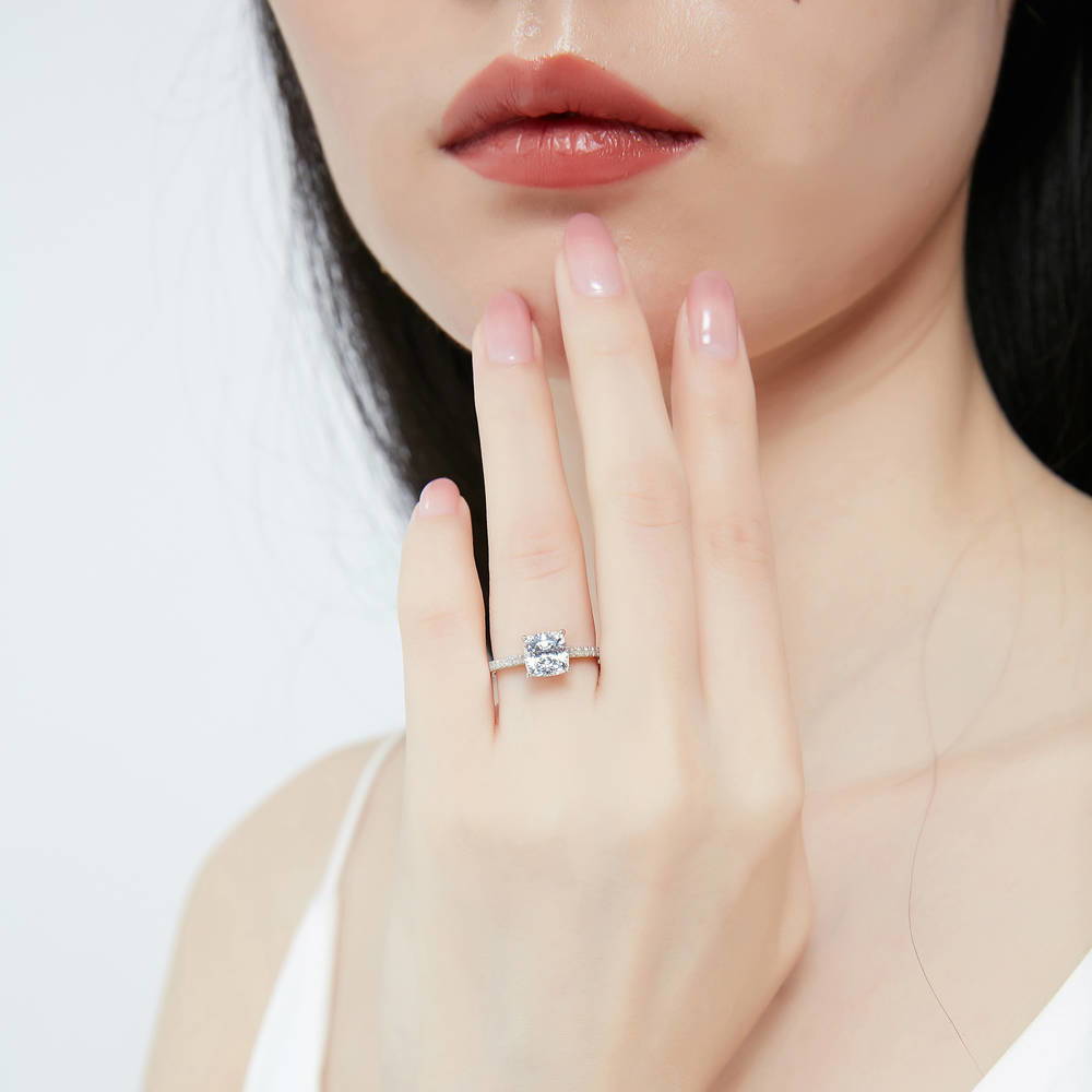 Model wearing Solitaire 2ct Cushion CZ Ring Set in Sterling Silver, 7 of 14
