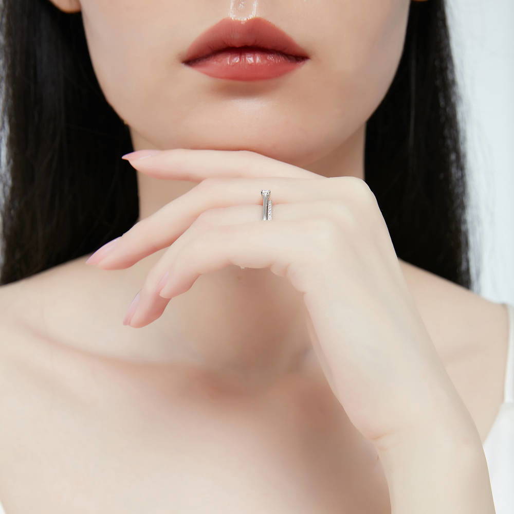 Model wearing East-West Solitaire CZ Ring Set in Sterling Silver