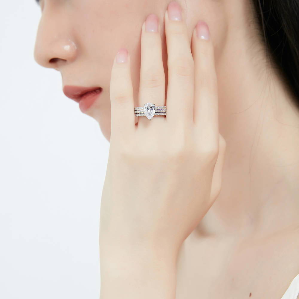 Model wearing Hidden Halo Solitaire CZ Ring Set in Sterling Silver