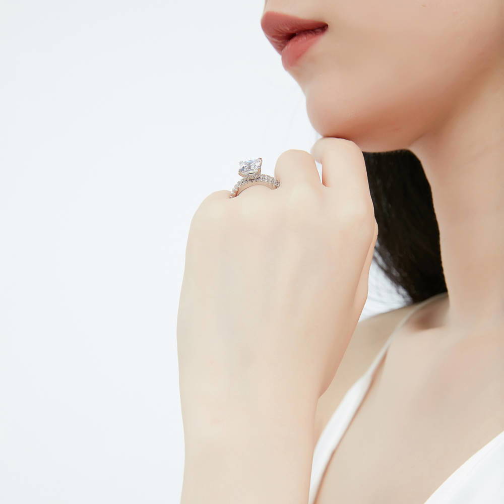 Model wearing Hidden Halo Solitaire CZ Ring Set in Sterling Silver