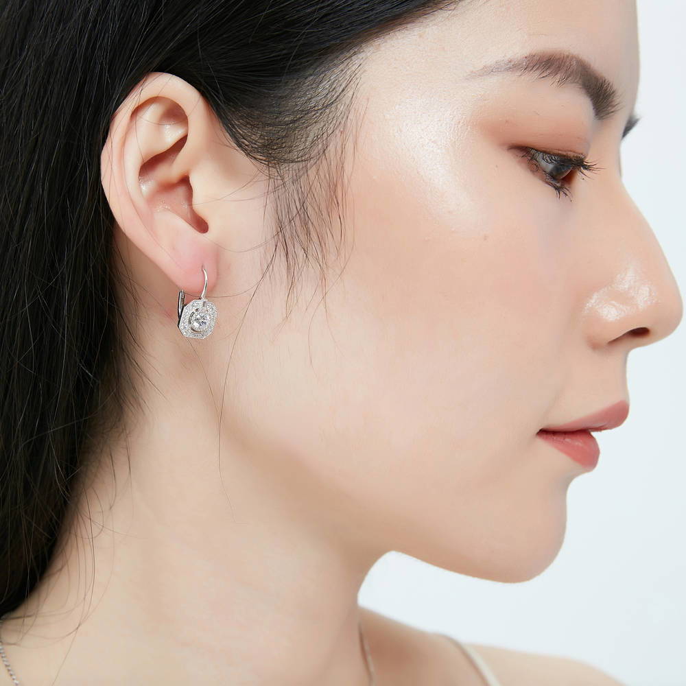 Model wearing Art Deco CZ Leverback Dangle Earrings in Sterling Silver