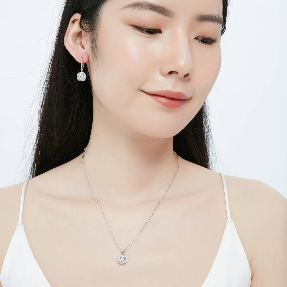Model wearing Halo Cushion CZ Necklace and Earrings Set in Sterling Silver