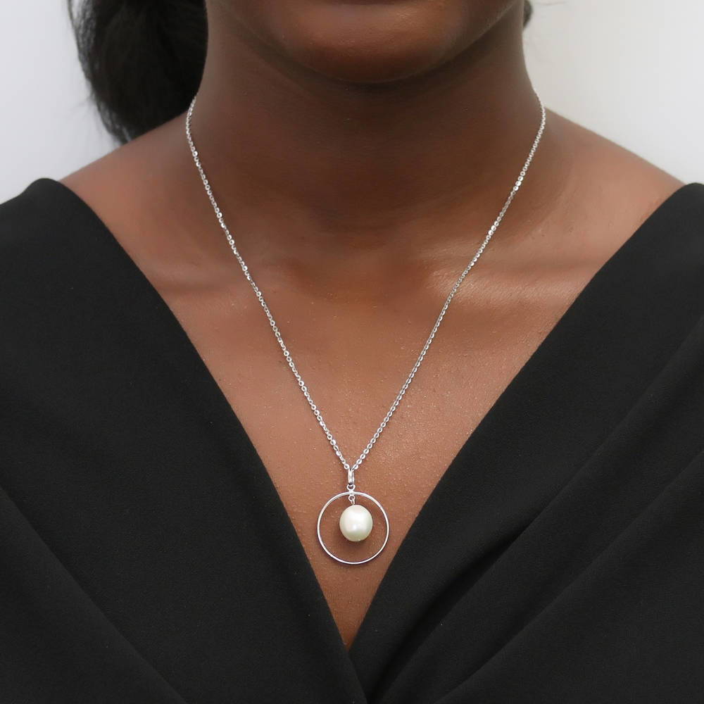 Model wearing Open Circle White Baroque Cultured Pearl Necklace in Sterling Silver