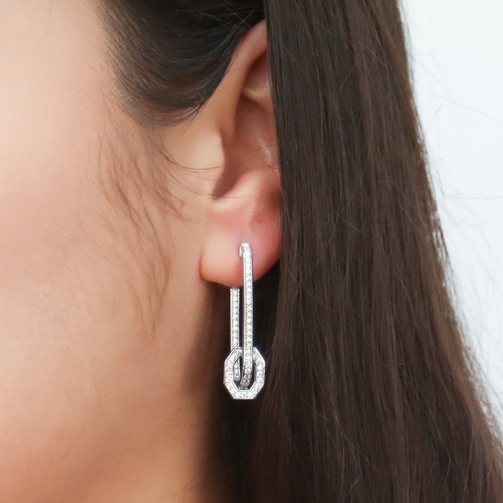 Model wearing Rectangle CZ Medium Inside-Out Hoop Earrings in Sterling Silver 1.3 inch, 2 of 5