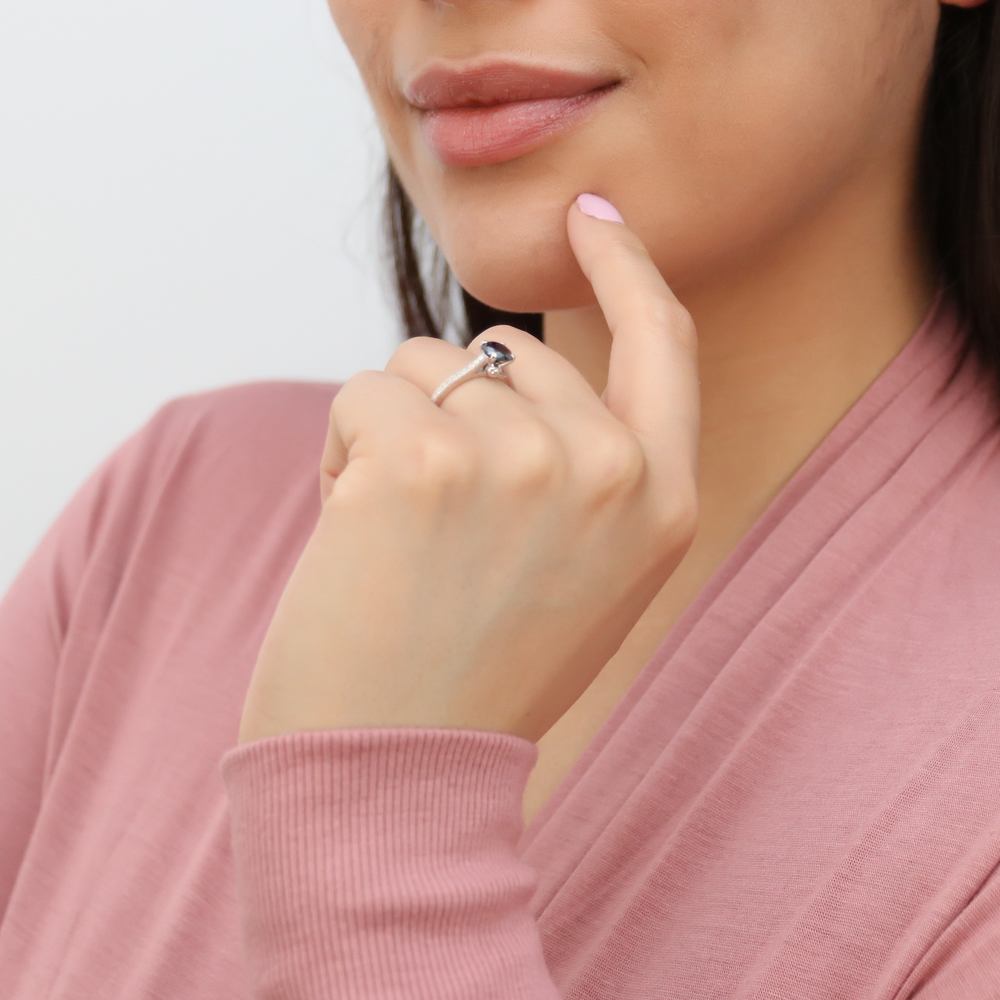 Model wearing Solitaire Black and White Round CZ Ring in Sterling Silver 1ct