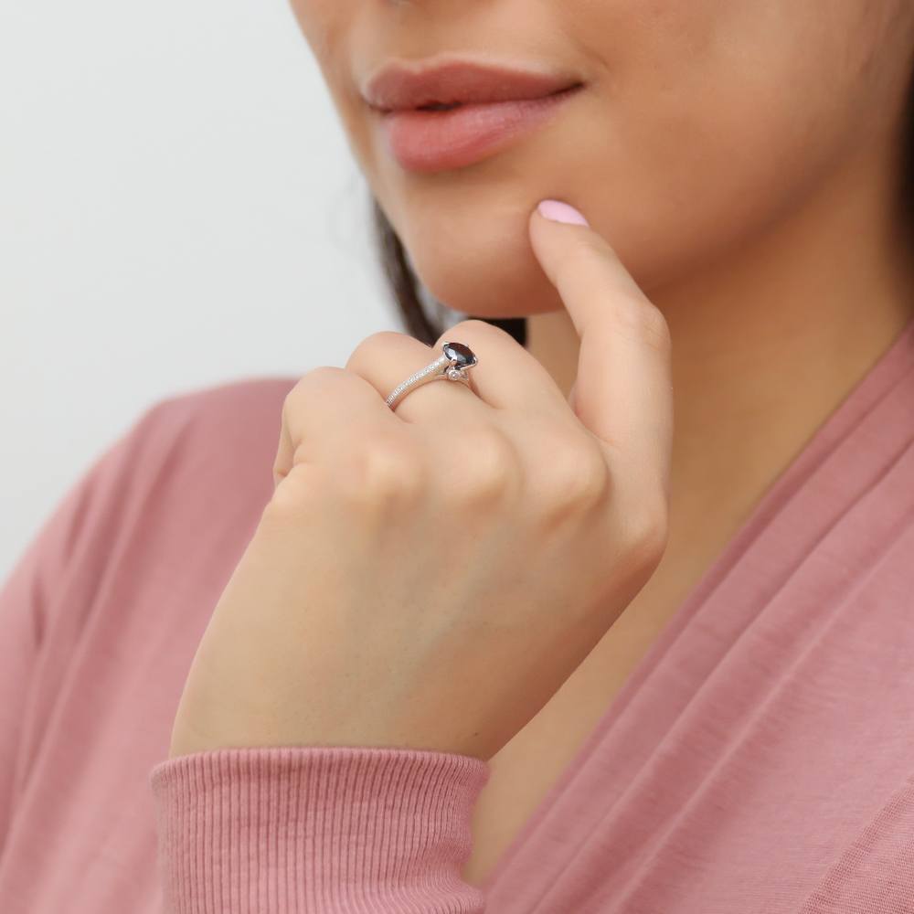 Model wearing Solitaire Black and White Round CZ Ring in Sterling Silver 1ct