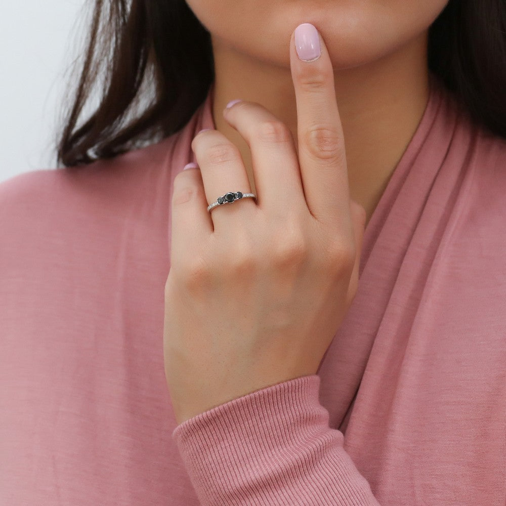 Model wearing 3-Stone Round CZ Ring in Sterling Silver