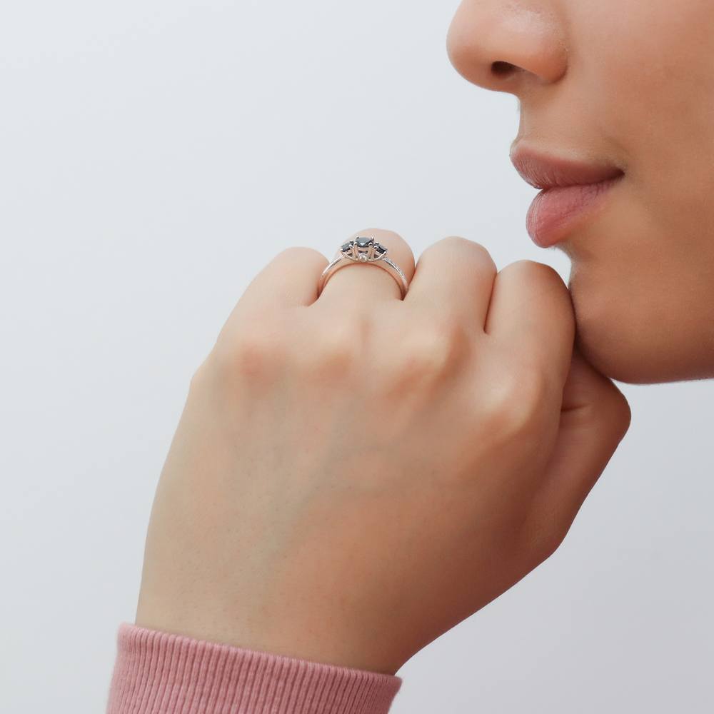 Model wearing 3-Stone Round CZ Ring in Sterling Silver, 3 of 11