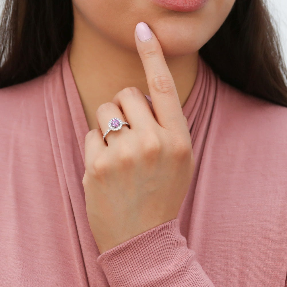 Model wearing Halo Purple Round CZ Ring in Sterling Silver