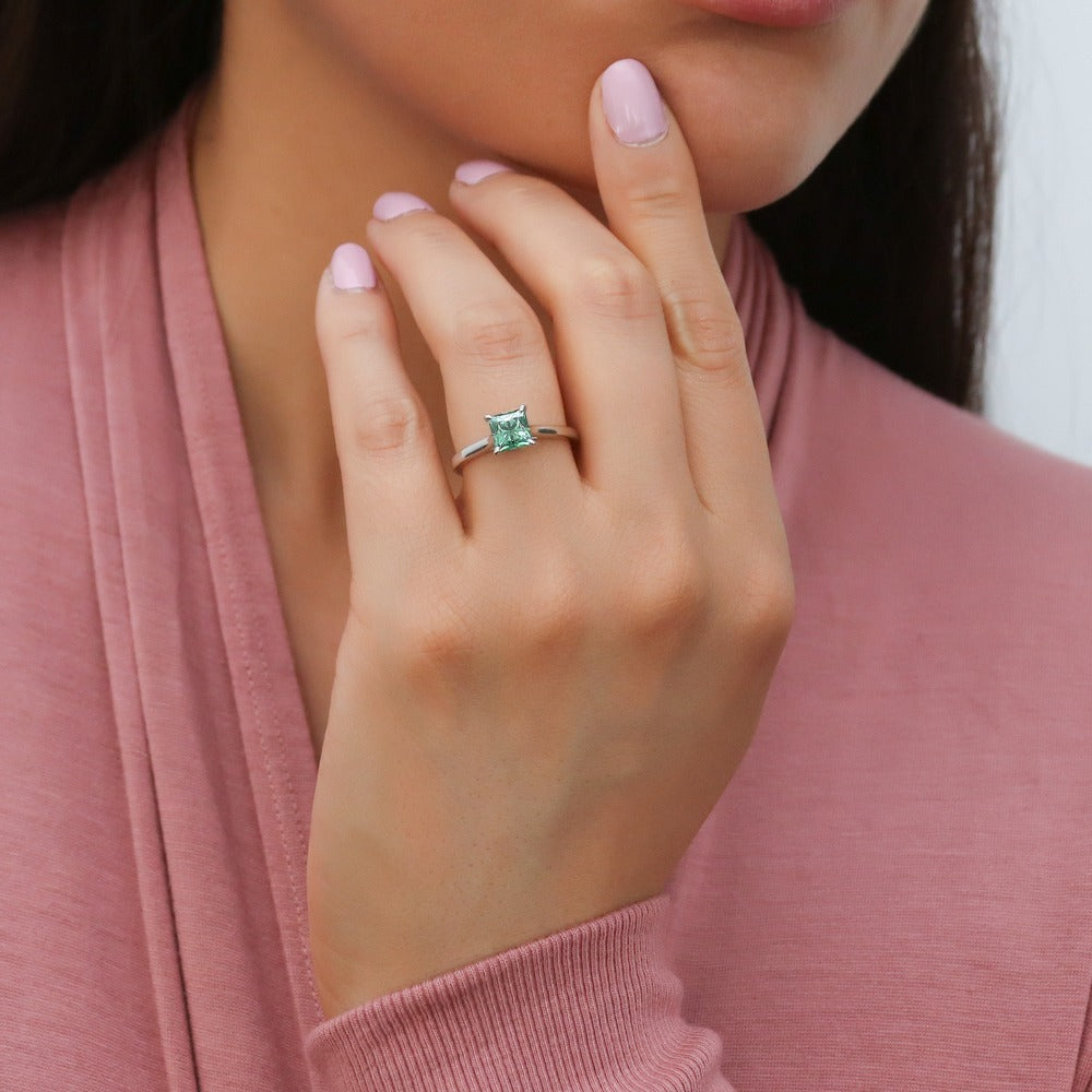 Model wearing Solitaire Green Princess CZ Ring in Sterling Silver 1.2ct