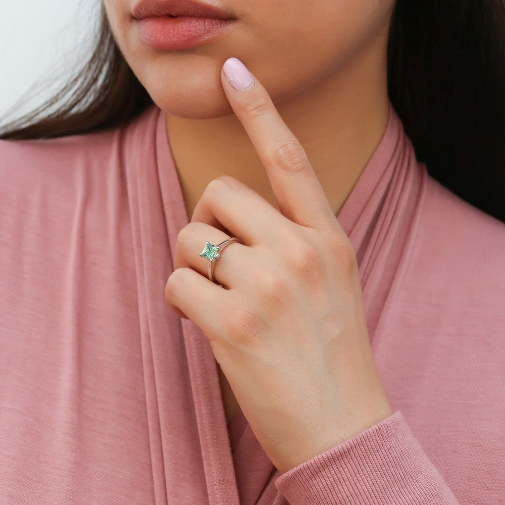 Model wearing Solitaire Green Princess CZ Ring in Sterling Silver 1.2ct