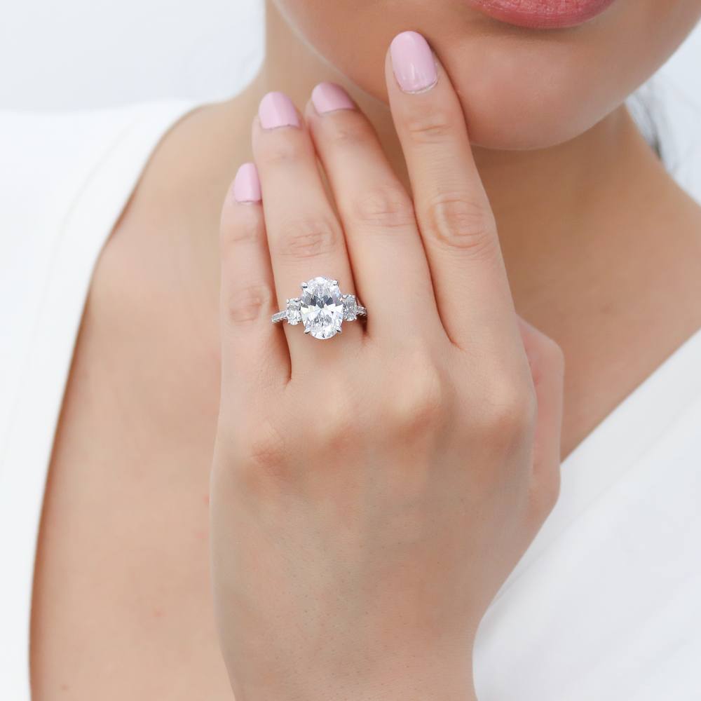 Model wearing 3-Stone Oval CZ Statement Ring in Sterling Silver