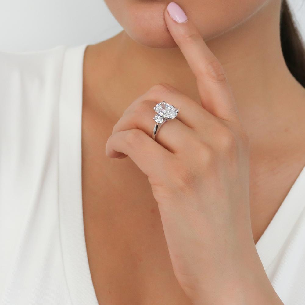 Model wearing 3-Stone Oval CZ Statement Ring in Sterling Silver