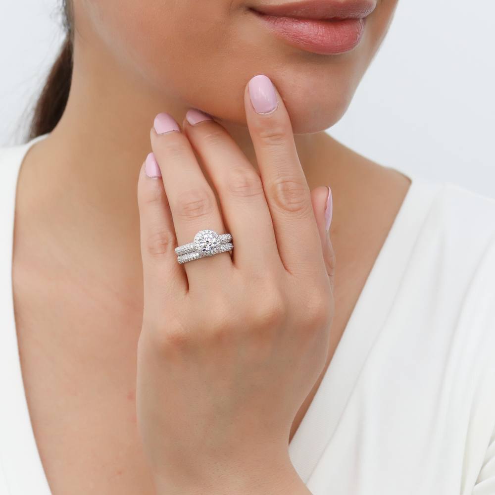 Model wearing Halo Round CZ Ring Set in Sterling Silver