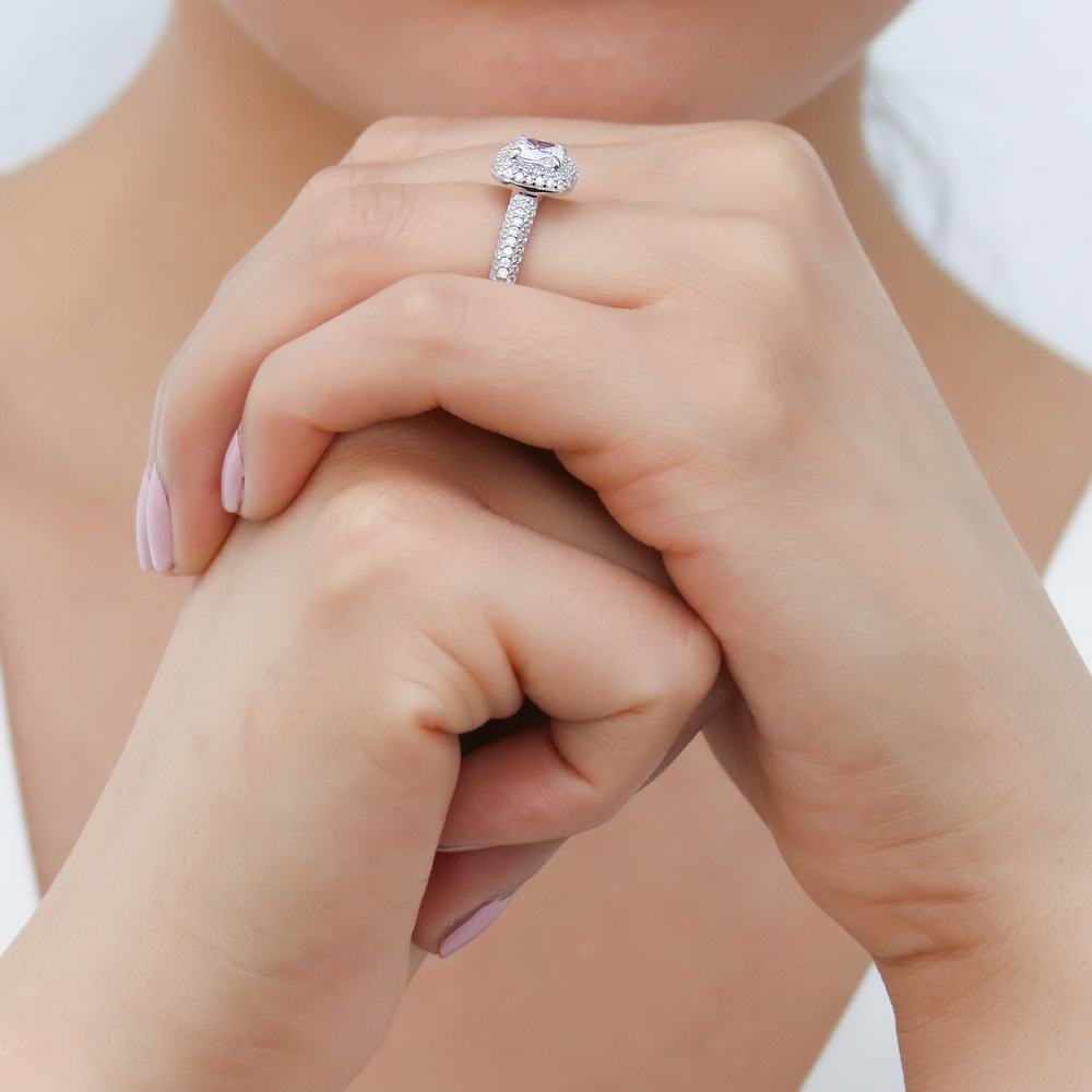 Model wearing Halo Cushion CZ Ring in Sterling Silver