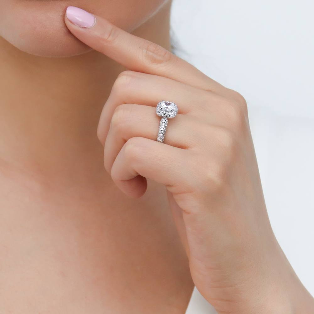 Model wearing Halo Cushion CZ Ring in Sterling Silver