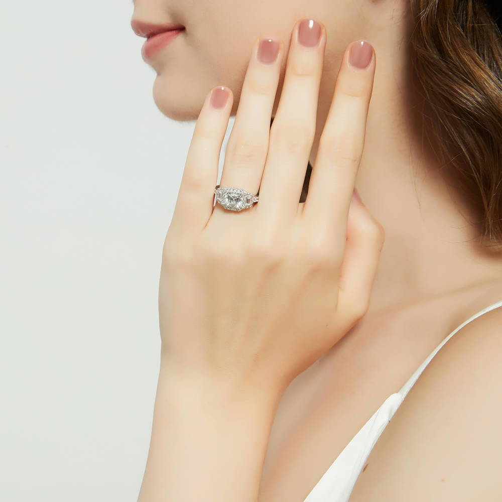 Model wearing Halo 3-Stone Asscher CZ Statement Ring in Sterling Silver