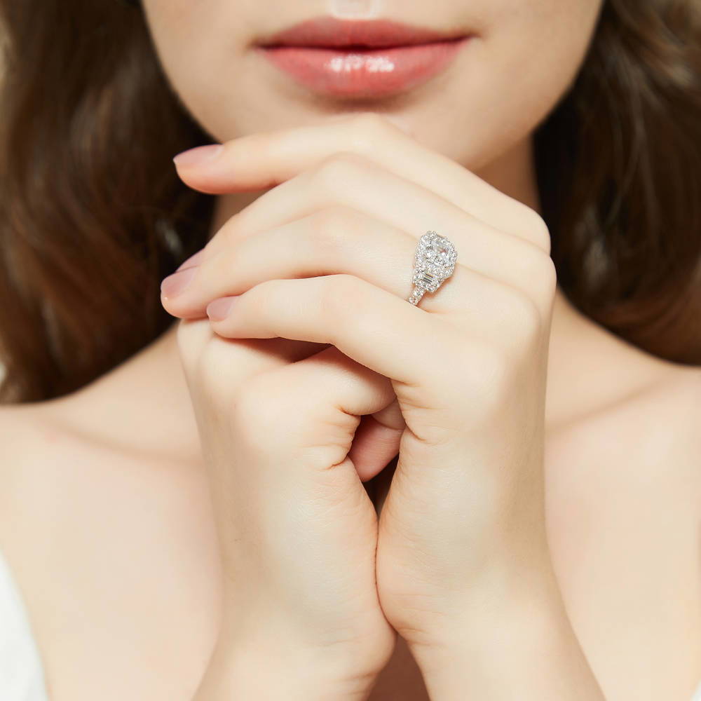 Model wearing Halo 3-Stone Asscher CZ Statement Ring in Sterling Silver