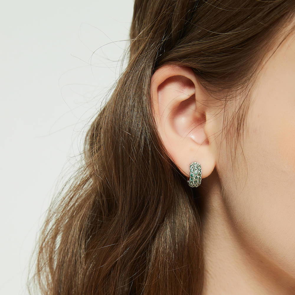 Model wearing CZ Small Huggie Earrings in Sterling Silver 0.5 inch