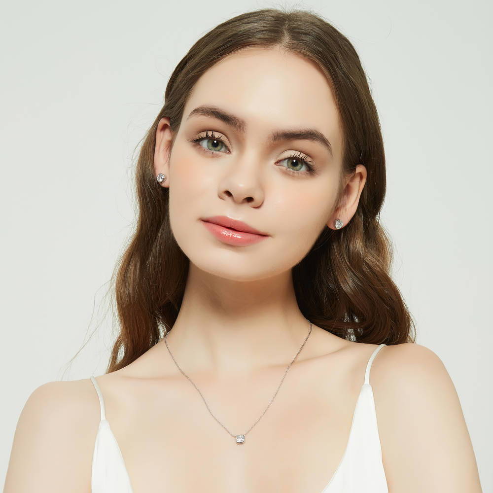 Model wearing Solitaire Bezel Set Cushion CZ Necklace in Sterling Silver 1.25ct, 3 of 6