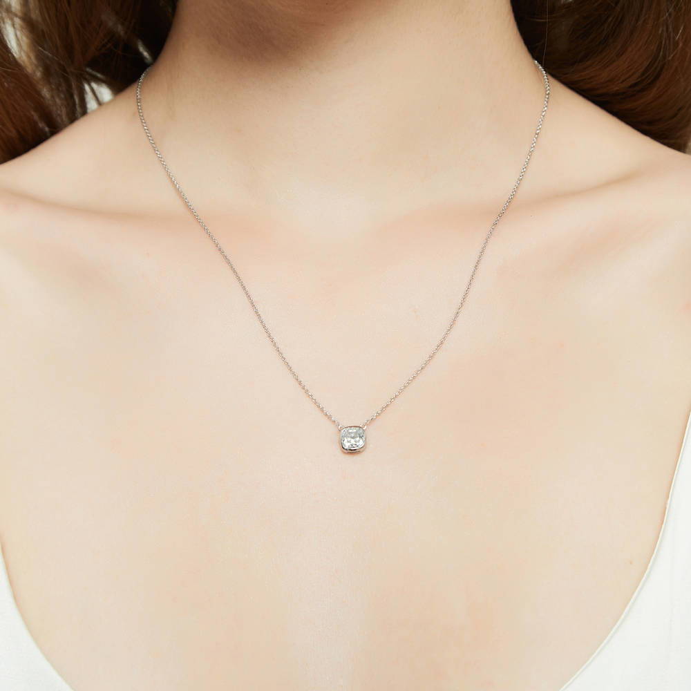 Model wearing Solitaire Bezel Set Cushion CZ Necklace in Sterling Silver 1.25ct, 2 of 6