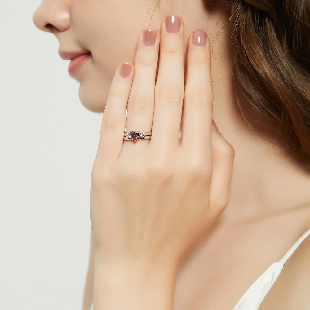 Model wearing 3-Stone Heart Red CZ Ring Set in Sterling Silver