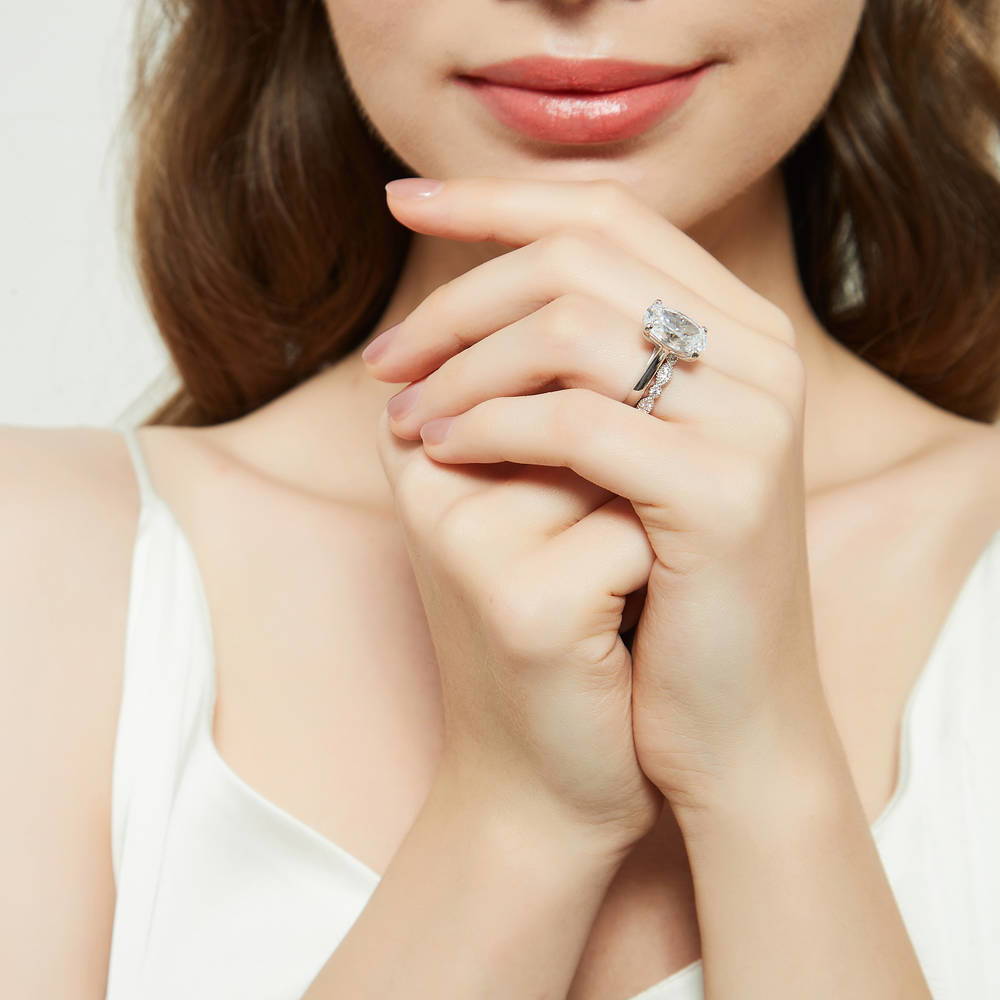 Model wearing Solitaire 5.5ct Oval CZ Ring Set in Sterling Silver, 6 of 18