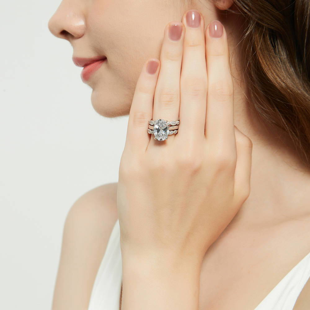 Model wearing Solitaire 5.5ct Oval CZ Ring Set in Sterling Silver, 5 of 18