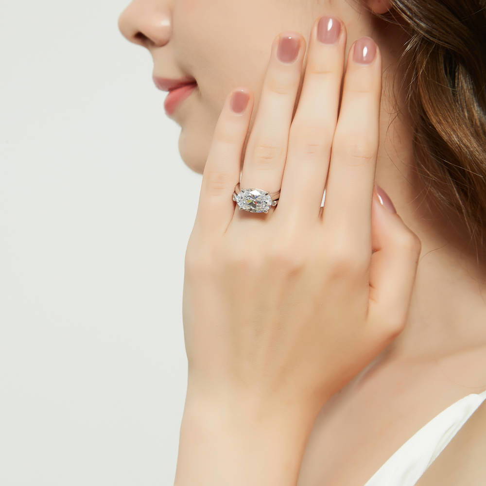 Model wearing East-West Solitaire CZ Ring Set in Sterling Silver