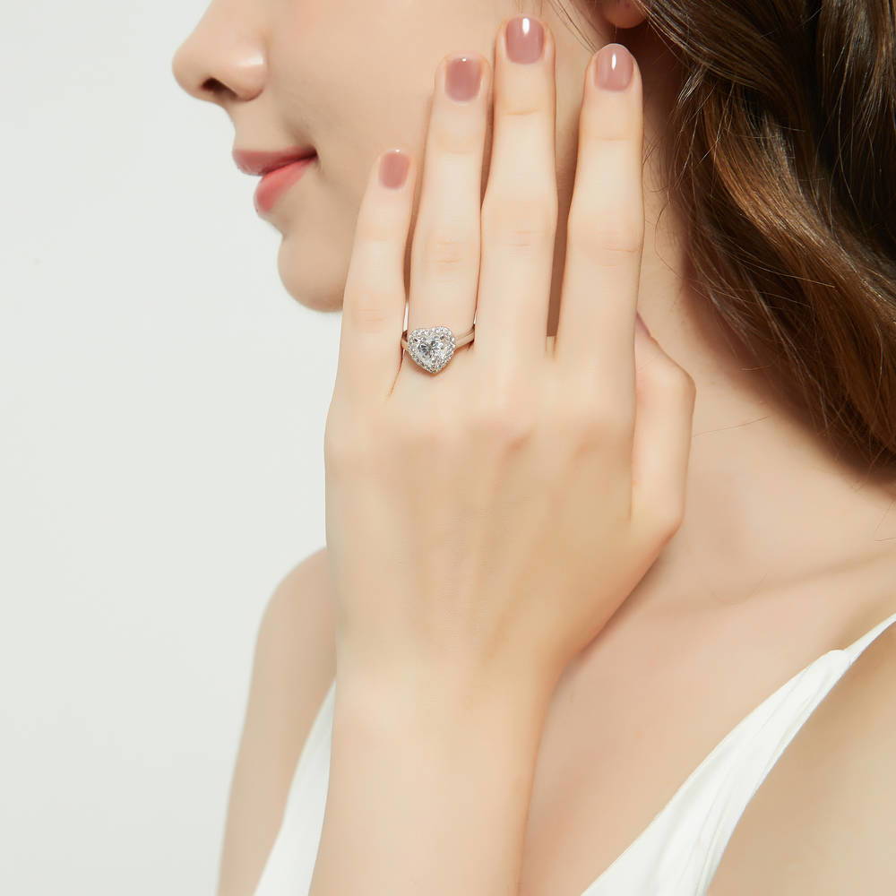 Model wearing Halo Heart CZ Ring in Sterling Silver