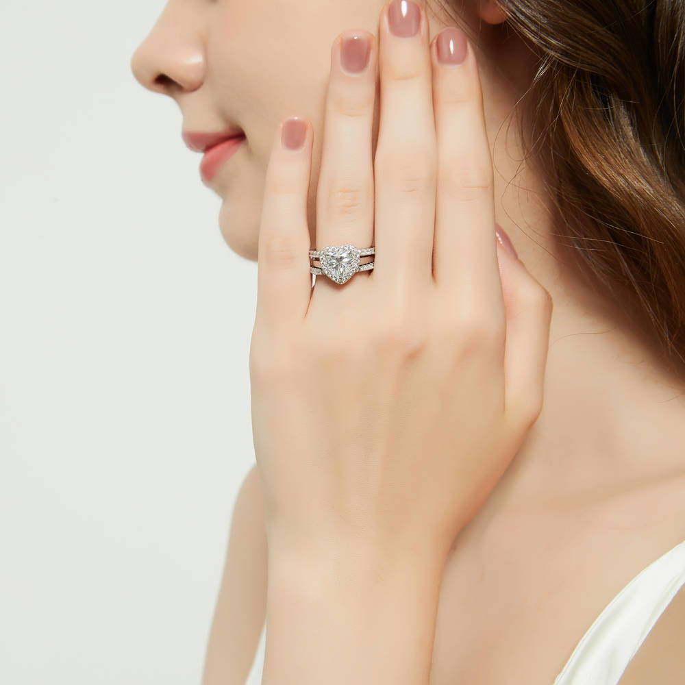 Model wearing Halo Heart CZ Ring Set in Sterling Silver