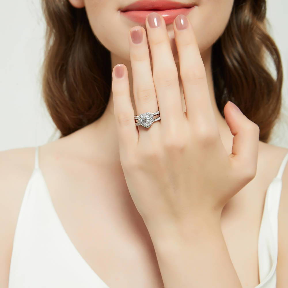 Model wearing Halo Heart CZ Ring Set in Sterling Silver