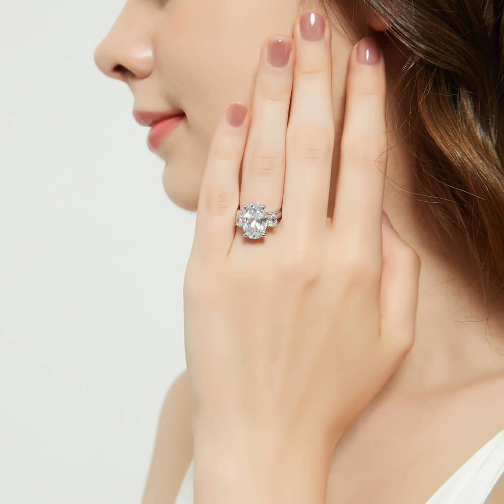 Model wearing 3-Stone Oval CZ Statement Ring in Sterling Silver