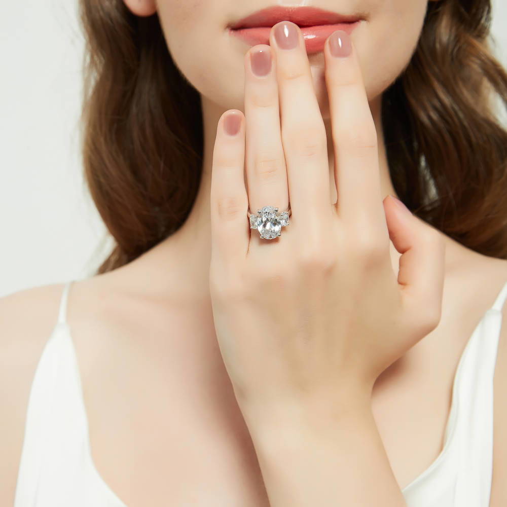 Model wearing 3-Stone Oval CZ Statement Ring in Sterling Silver