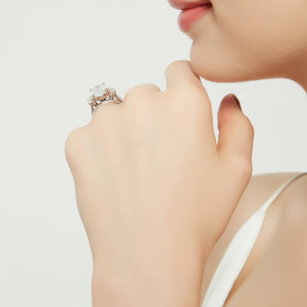 Model wearing 3-Stone Oval CZ Ring Set in Sterling Silver