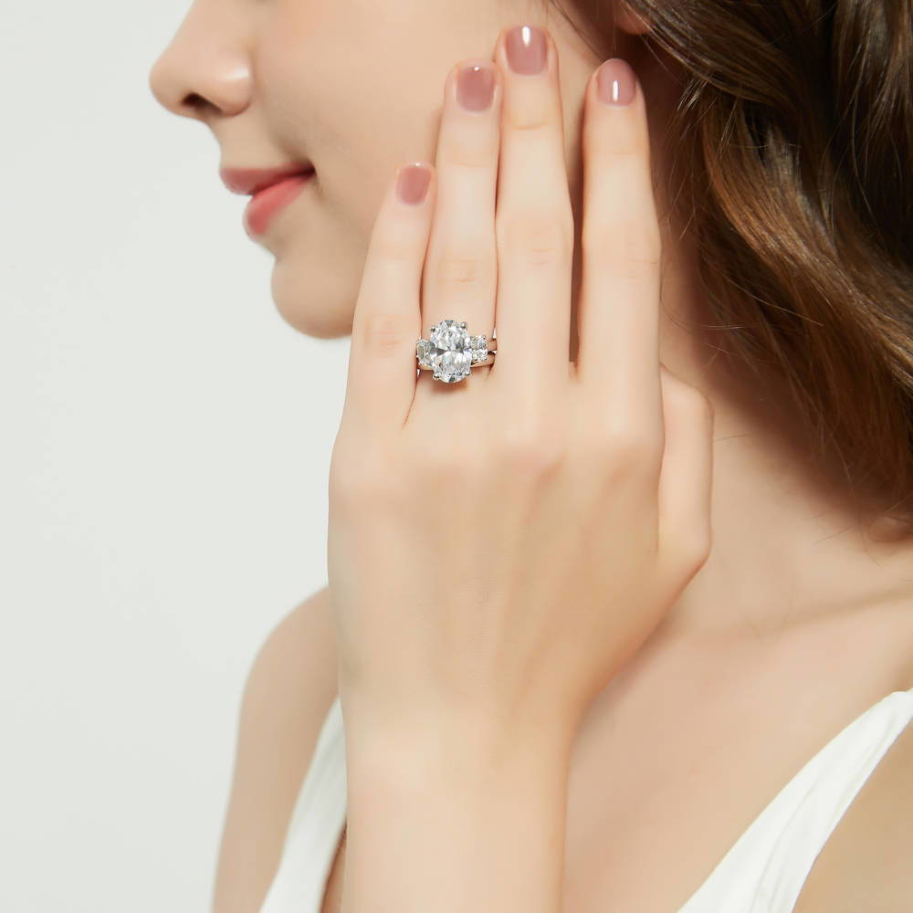 Model wearing 3-Stone Oval CZ Ring Set in Sterling Silver