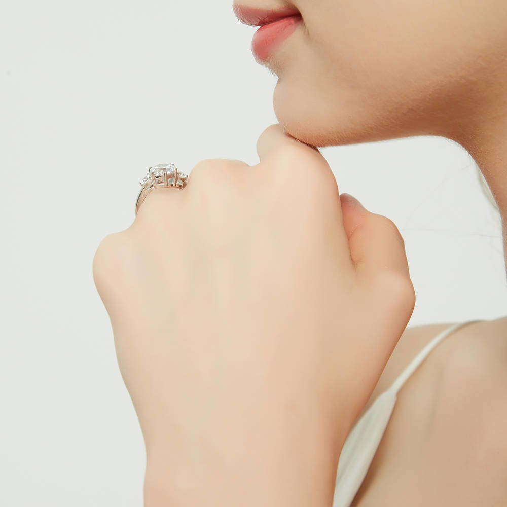 Model wearing 3-Stone Round CZ Ring in Sterling Silver