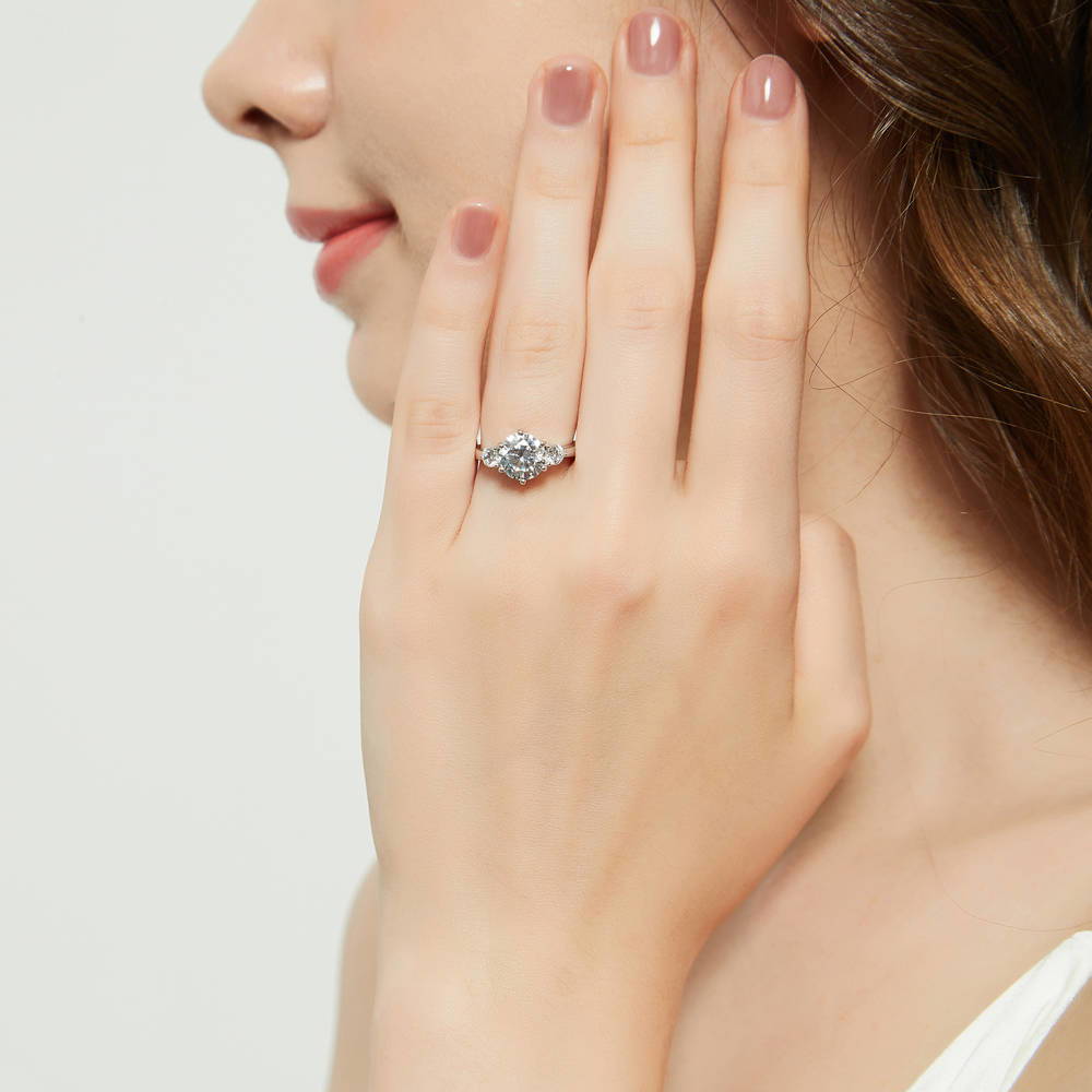 Model wearing 3-Stone Round CZ Ring in Sterling Silver