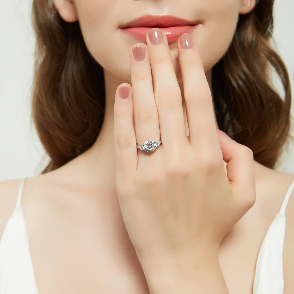 Model wearing 3-Stone Round CZ Ring in Sterling Silver