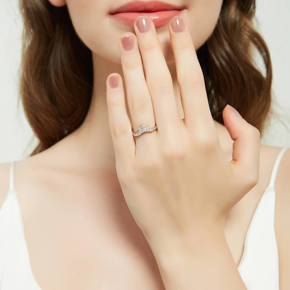 Model wearing Flower 7-Stone CZ Curved Band in Sterling Silver