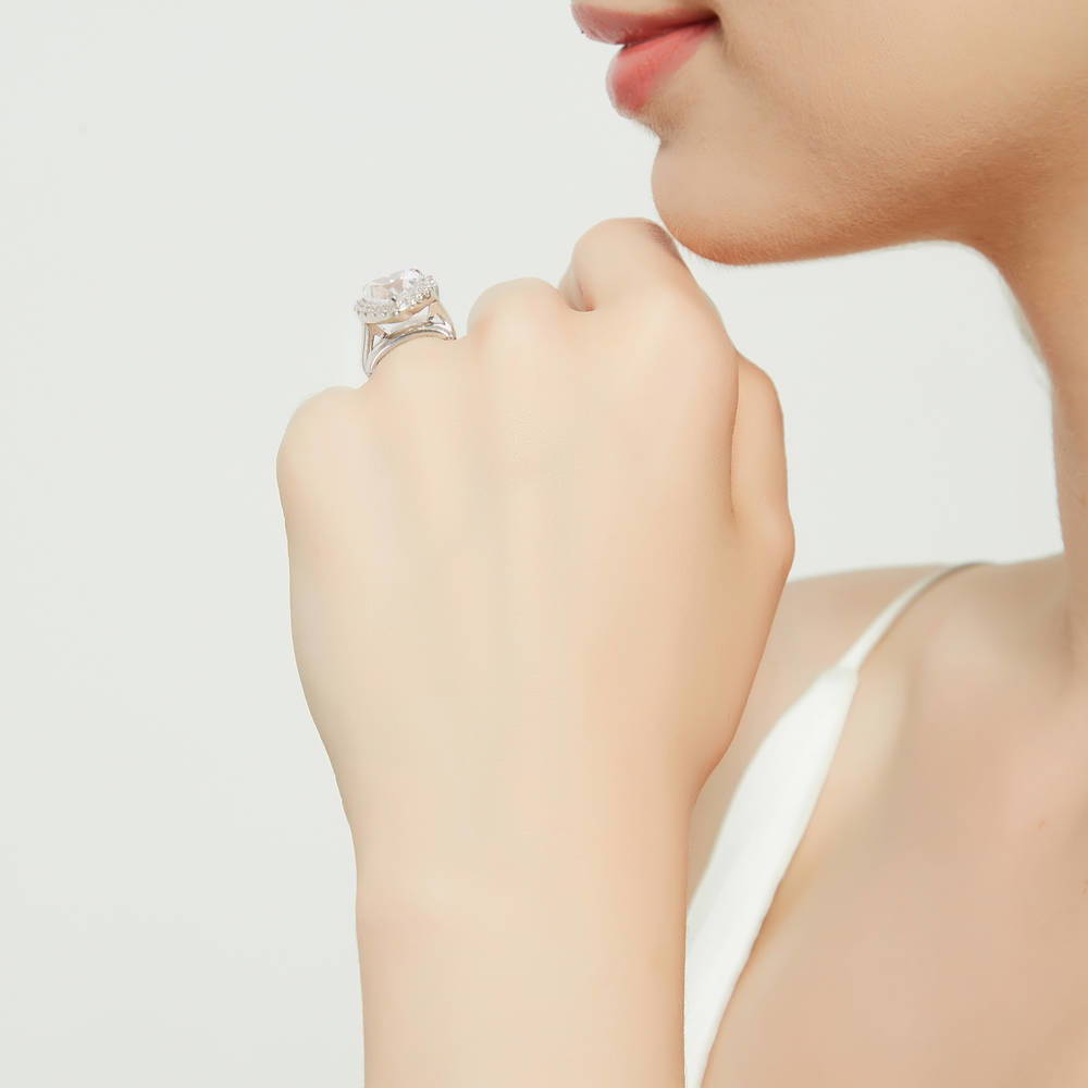 Model wearing Halo Heart CZ Ring Set in Sterling Silver