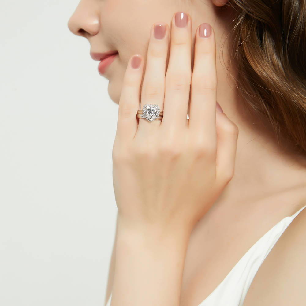 Model wearing Halo Heart CZ Ring Set in Sterling Silver